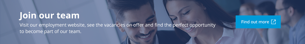 Boy and girl smiling in the office