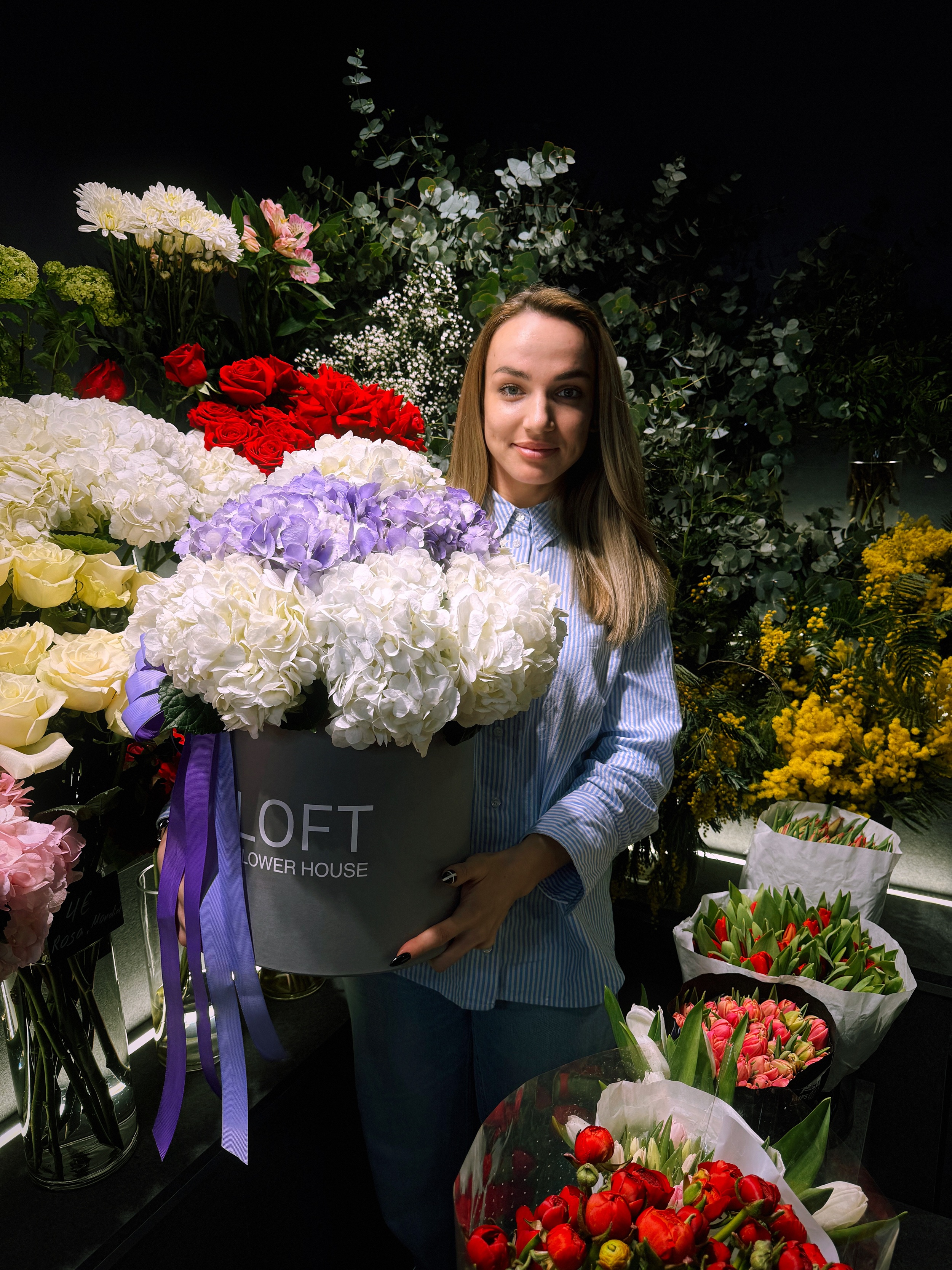 Entrepreneur Yuliia Verko on the opening day of her business Loft Flower House.